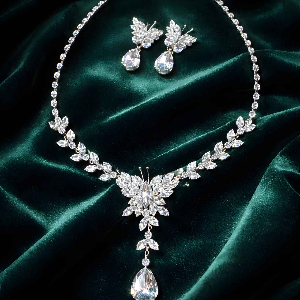 Crystal Bloom necklace with leaf-flower crystals, matching drop pendant and stud earrings