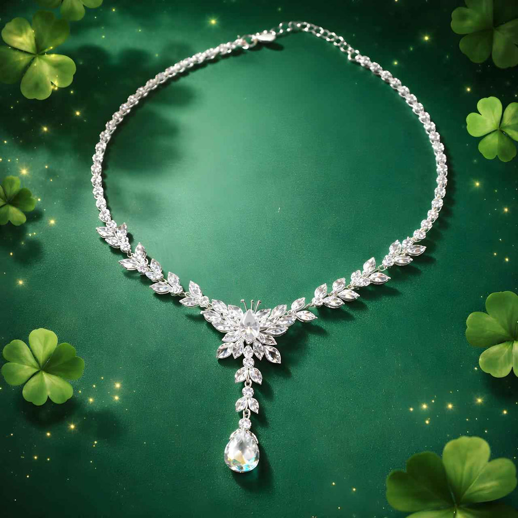 Crystal Bloom necklace with layered leaf crystals and teardrop drop pendant