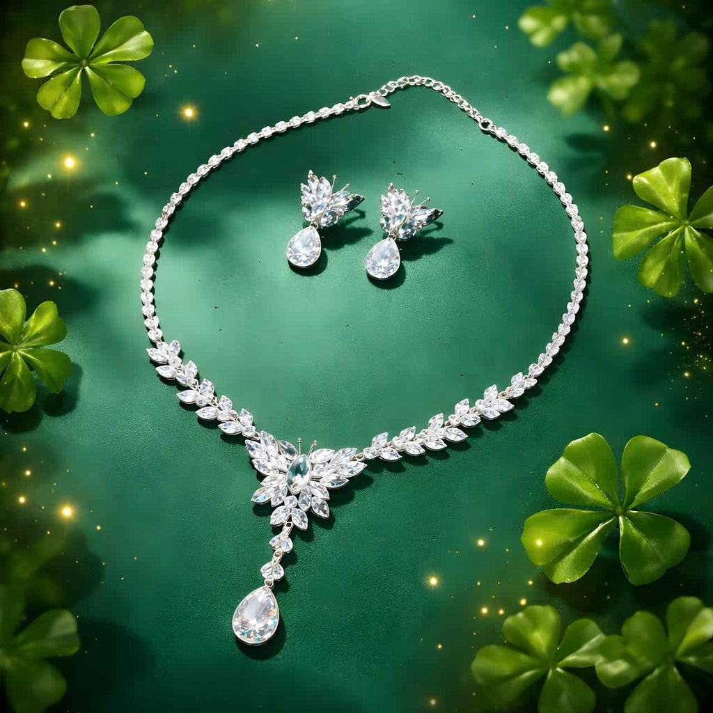 Crystal Bloom jewelry set with teardrop crystal necklace and floral stud earrings