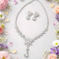 Crystal Bloom crystal necklace set, silver-tone floral design with teardrop pendant