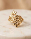 Leaf statement ring with gold-tone filigree leaf design