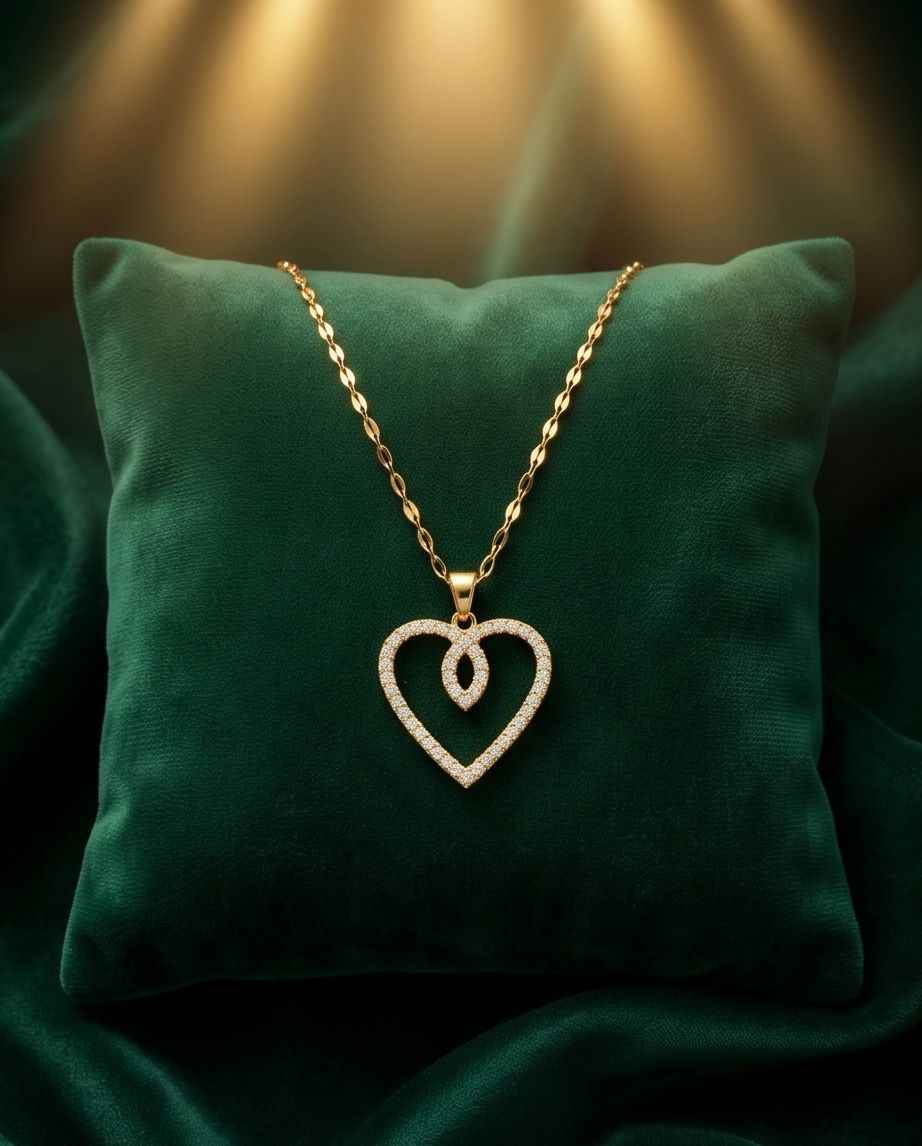 Gold heart pendant necklace with pavé sparkle on a fine chain