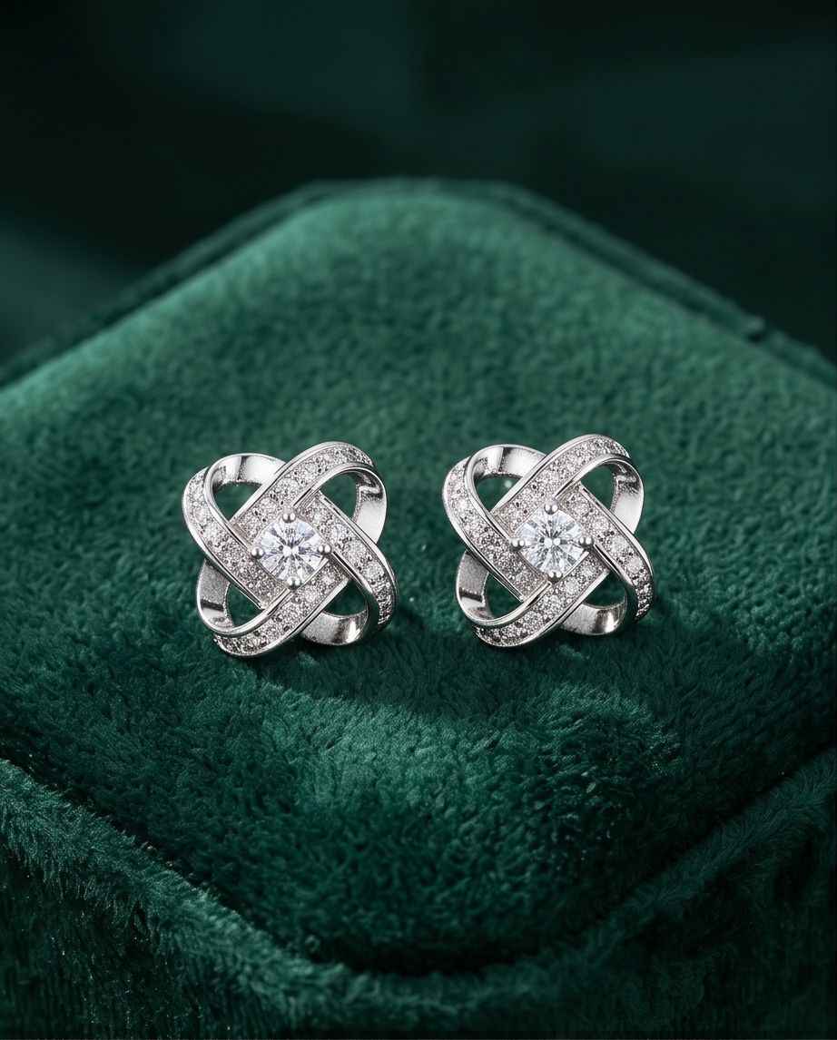 Sterling silver knot stud earrings with pavé sparkle and center round stone, pair