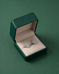 Flower diamond stud earrings with round halo stones, silver-tone settings