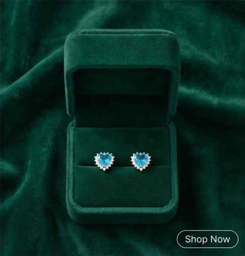 Blue heart halo stud earrings, silver-tone setting with clear stone halo