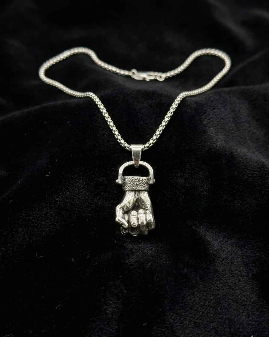Silver-tone pendant necklace with clasp chain and hand-shaped charm
