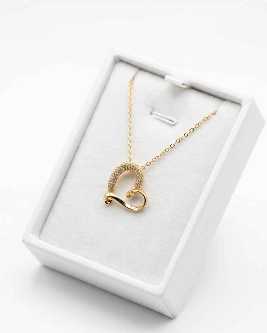 Gold-tone pavé curve heart necklace pendant on chain, in white display box