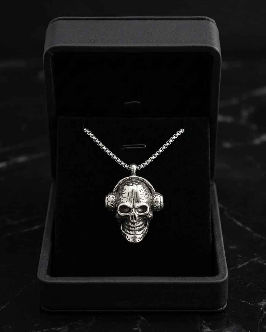 Silver-toned skull pendant necklace with twisted chain and centered skull face