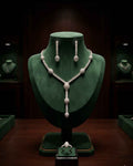 Cascading bead necklace set with teardrop crystal drops and matching stud earrings