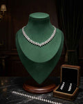 Diamond line necklace set with rhinestone links and matching stud earrings