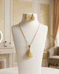 Gold teardrop pendant necklace and matching teardrop earrings set