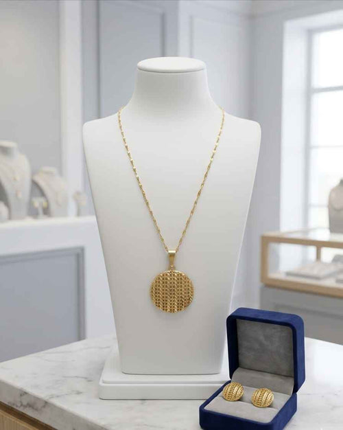 Gold-tone medallion pendant necklace with matching stud earrings, round lattice design