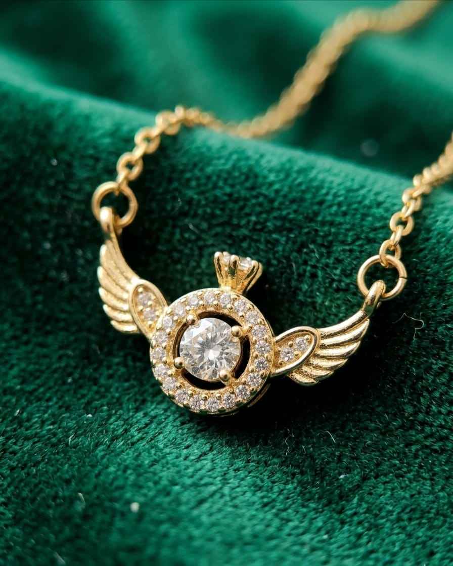 Gold winged halo pendant necklace with round crystal center and small pavé details