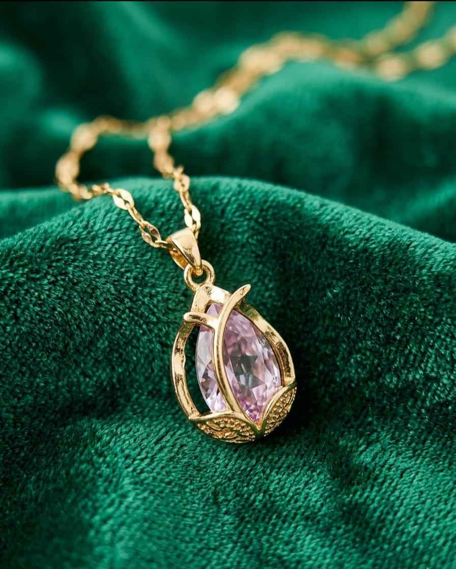 Gold teardrop amethyst pendant necklace close-up