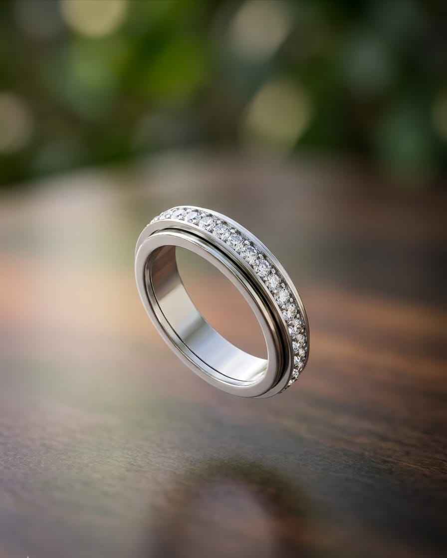 Silver pavé band ring with clear stones, polished interior view