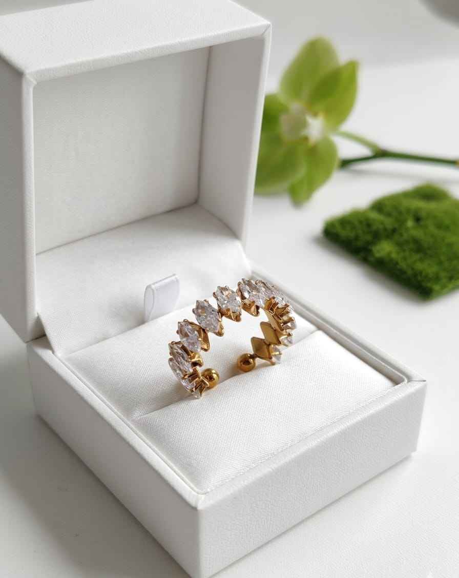 Marquise pavé open ring with gold prongs, displayed in gift box