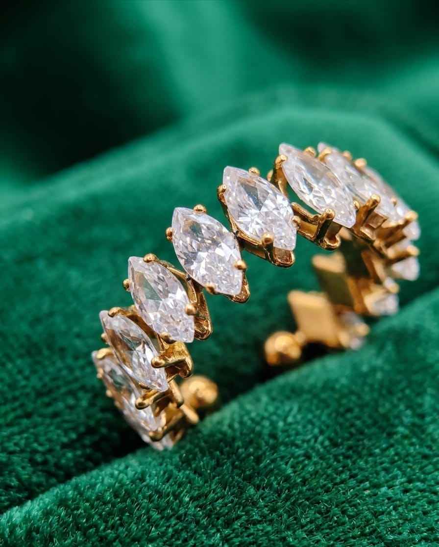 Gold open ring with marquise pavé stones, side view