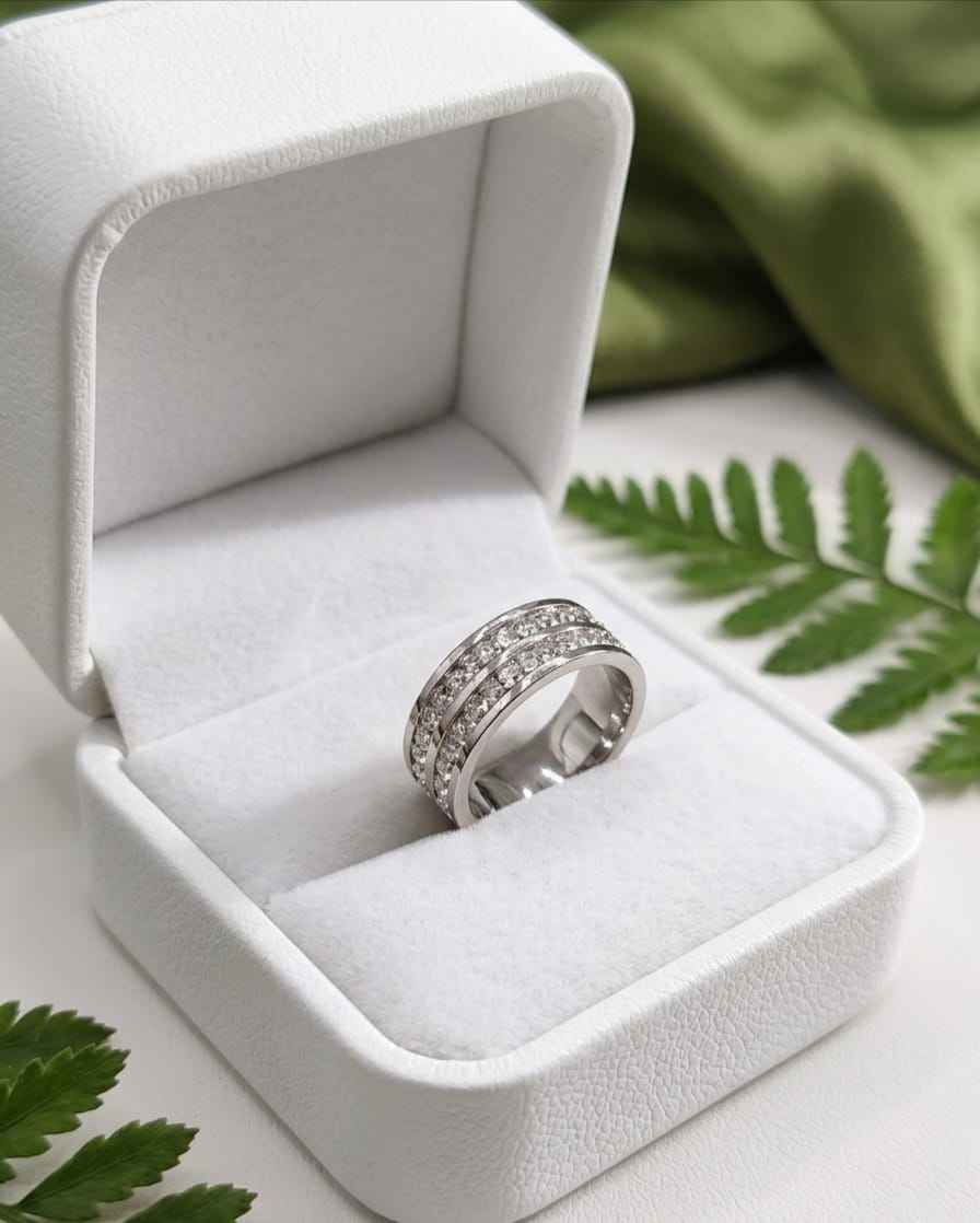 Silver-tone triple band ring with clear stones in a white gift box
