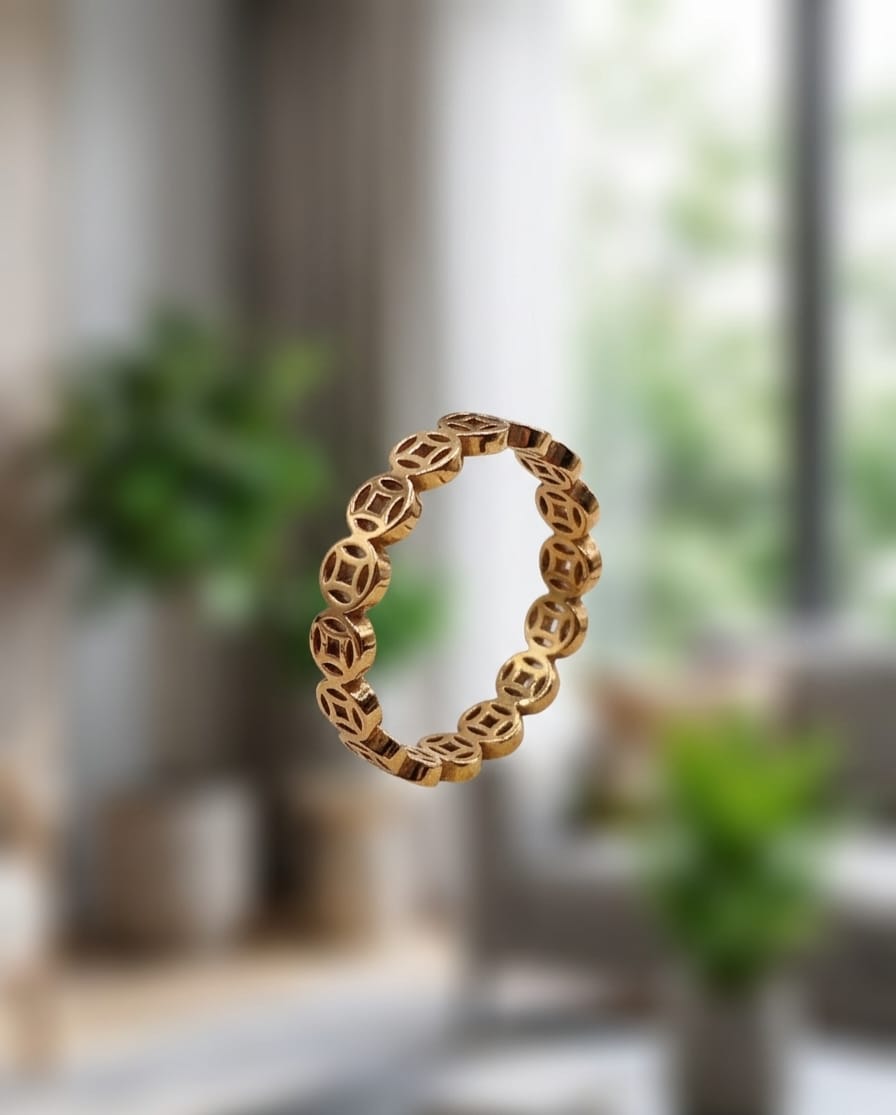 Gold chain-weave ring front view on a light background