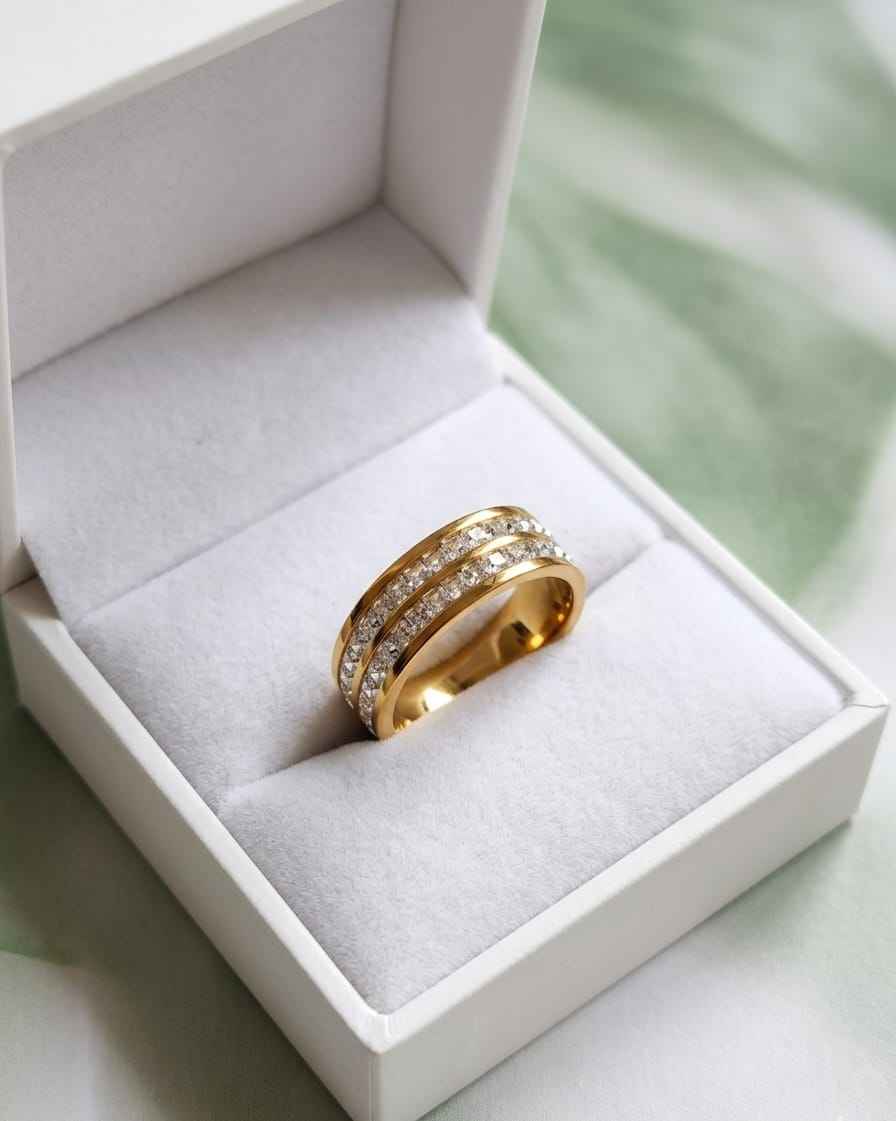 Gold-tone double-row crystal ring displayed in a gift box