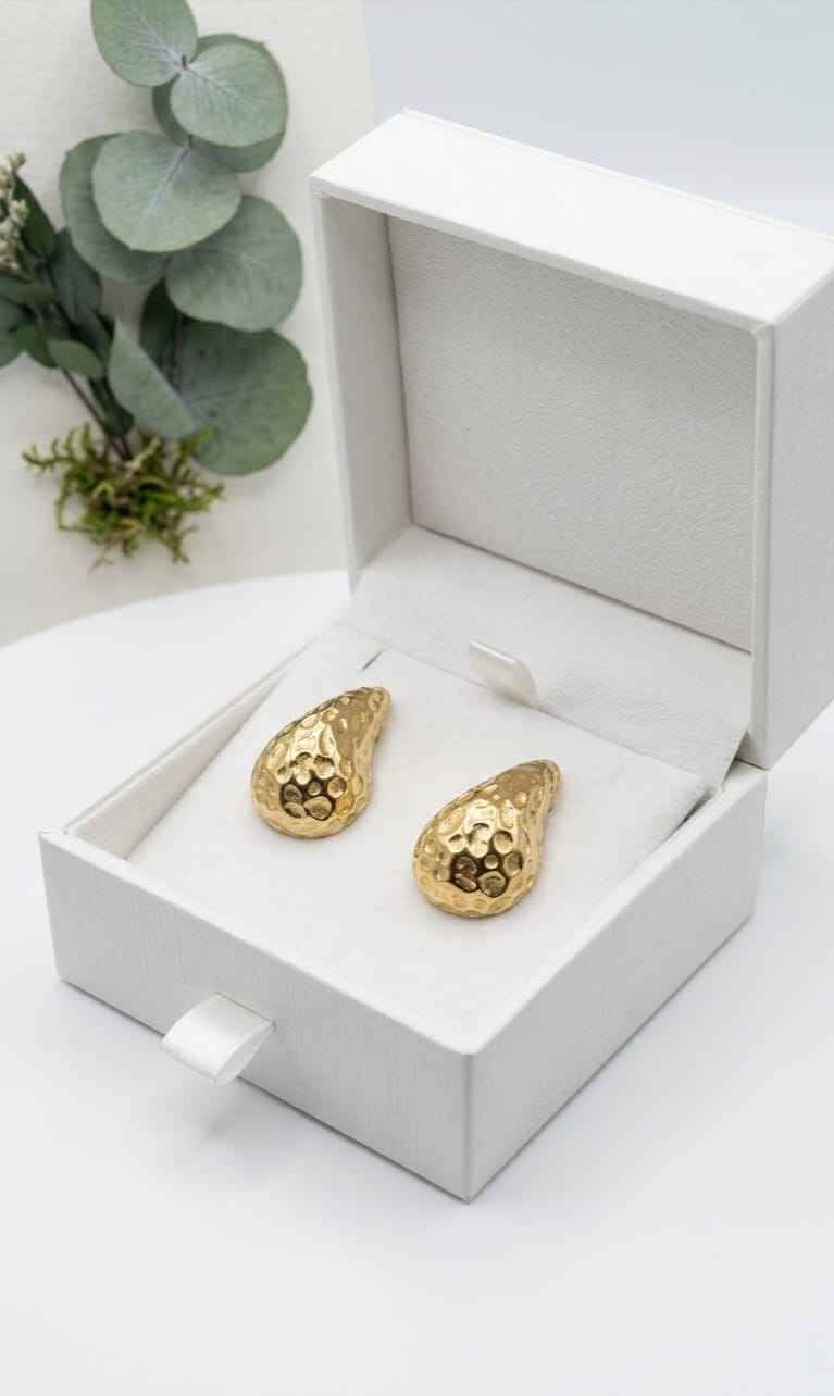 Hammered teardrop stud earrings in box, gold-tone textured teardrop studs