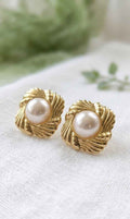 Pearl floral stud earrings with gold-tone ornate leaf frames and round white pearls